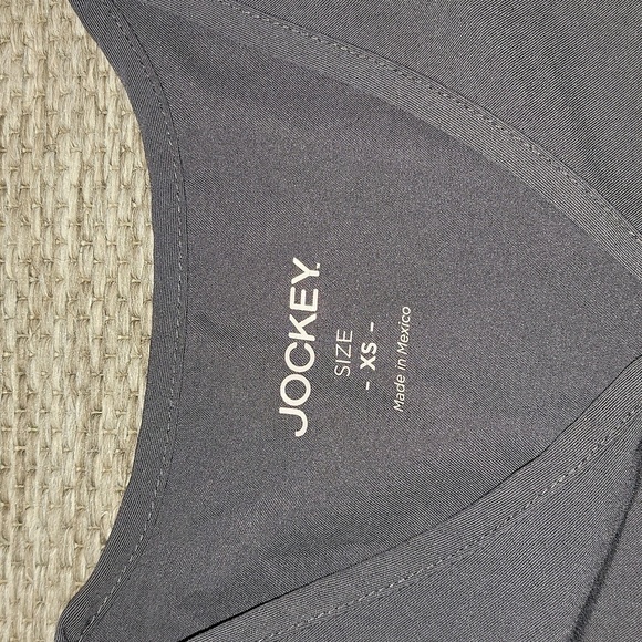 Jockey scrub top size XS. Gray, short sleeve, zipper pockets. - Picture 3 of 8